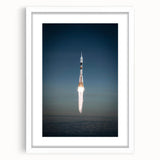 Extra large abstract art print of a spacecraft, in vibrant gray and blue tones on a white framed canvas.