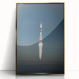 Mid-century modernist art deco poster featuring a spacecraft, with vibrant gold and black hues, framed in acrylic.