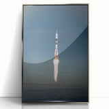 Art deco poster of a spacecraft, silver framed acrylic, with muted metallic tones, suitable for modern nursery wall decor.