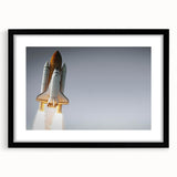 Colorful abstract art print featuring vibrant, textured spacecraft designs on a large black-framed canvas.