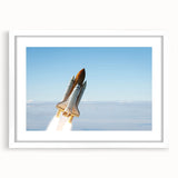 Extra large abstract art print of a spacecraft design in muted metallic colors on a framed white mat.