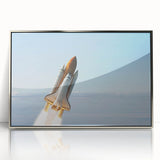 Art deco poster of a spacecraft, with silver frame and acrylic print, in muted metallic tones.