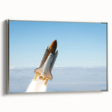Framed vintage poster art of a spacecraft, featuring a black background with colorful accents, ideal for living room decor.