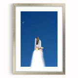 Abstract art print of a spacecraft in silver and gray tones, framed with a silver mat.