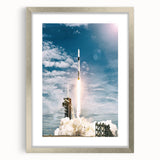 Abstract art print featuring a spacecraft design in silver and gray tones, framed with a silver mat.