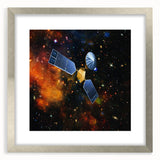 Abstract art print of a spacecraft in silver and gray tones on a framed canvas.