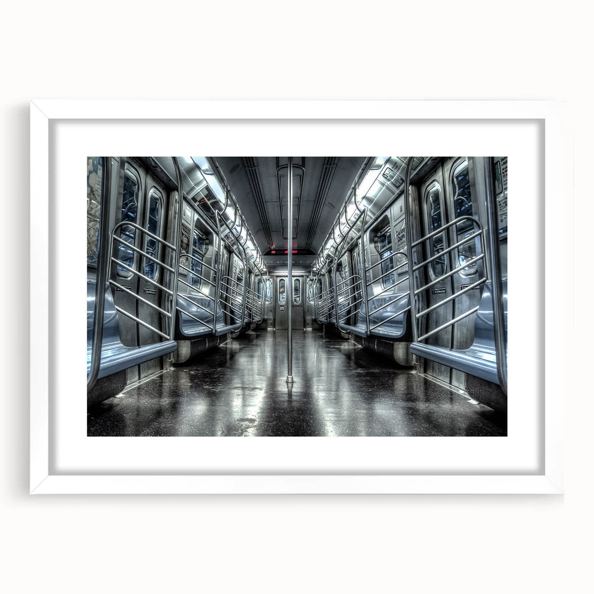Abstract art print of a stylized subway design in muted gray and blue tones, framed with a white mat.