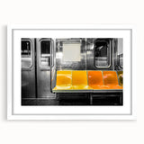 Abstract art print of a subway in muted gray and blue tones, framed with a white mat.