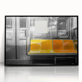 Large abstract wall art depicting a subway scene in muted grays and blues, framed in black acrylic.