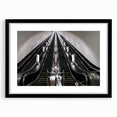 Abstract art print featuring a colorful, textured depiction of a subway, in a black frame with mat.