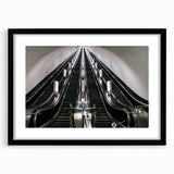 Abstract art print featuring a colorful, textured depiction of a subway, in a black frame with mat.