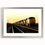 Textured art print of an abstract train in muted gray and silver, framed with mat, ideal for bedroom art.