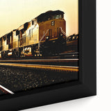 Extra large framed canvas featuring a black, textured train illustration with colorful accents, ideal for living room decor.