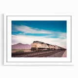 Abstract train design in muted gray and blue tones on a white framed poster, suitable for modern dining room decor.