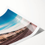 Extra large wall art featuring a vintage train in muted earth tones on rolled print, ideal for large living room decor.