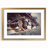 Extra large abstract art print of a train, featuring textured gold and black tones on a framed canvas.