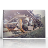 Art deco train poster in vibrant colors on white framed acrylic, suitable for modern nursery decor.