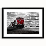 Colorful, abstract art print of a stylized train, in a black frame, suitable for extra large living room decor.