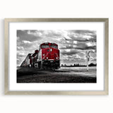 Abstract train-themed textured art print in muted gray, framed in silver, suitable for bedroom decor.