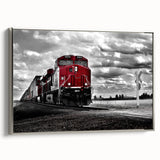 Framed canvas featuring a vintage train in black and colorful hues, ideal for enhancing a home office or living room decor.