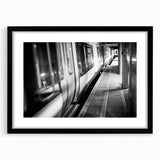 Extra large abstract art print of a colorful, textured train on a black framed canvas, ideal for living room decor.