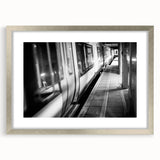 Textured abstract art print of a train in muted gray and blue tones on a framed poster, ideal for bedroom art.
