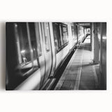 Black and white photo of a vintage train on stretched canvas, ideal for kitchen wall art or bedroom ambiance.