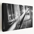 Side view of a large, stretched canvas depicting a vintage train in muted earth tones, ideal for kitchen wall art.