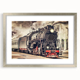 Textured abstract art print of a train in muted earth tones on a framed silver mat, suitable for bedroom decor.