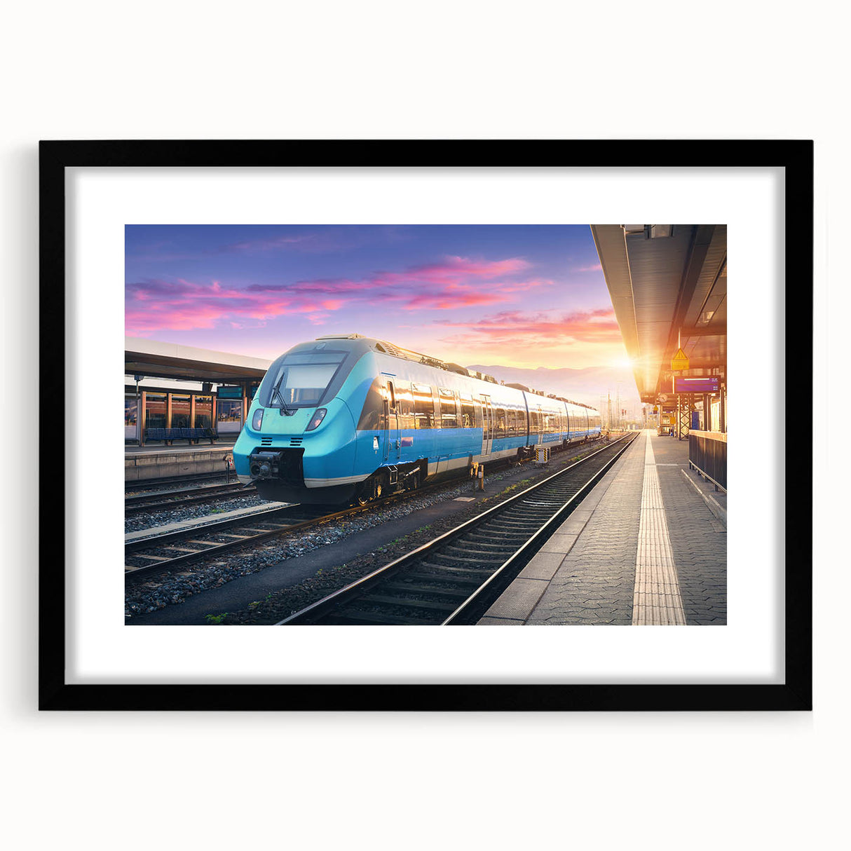 Extra large abstract art print of a colorful, textured train, framed in black, ideal for living room decor.
