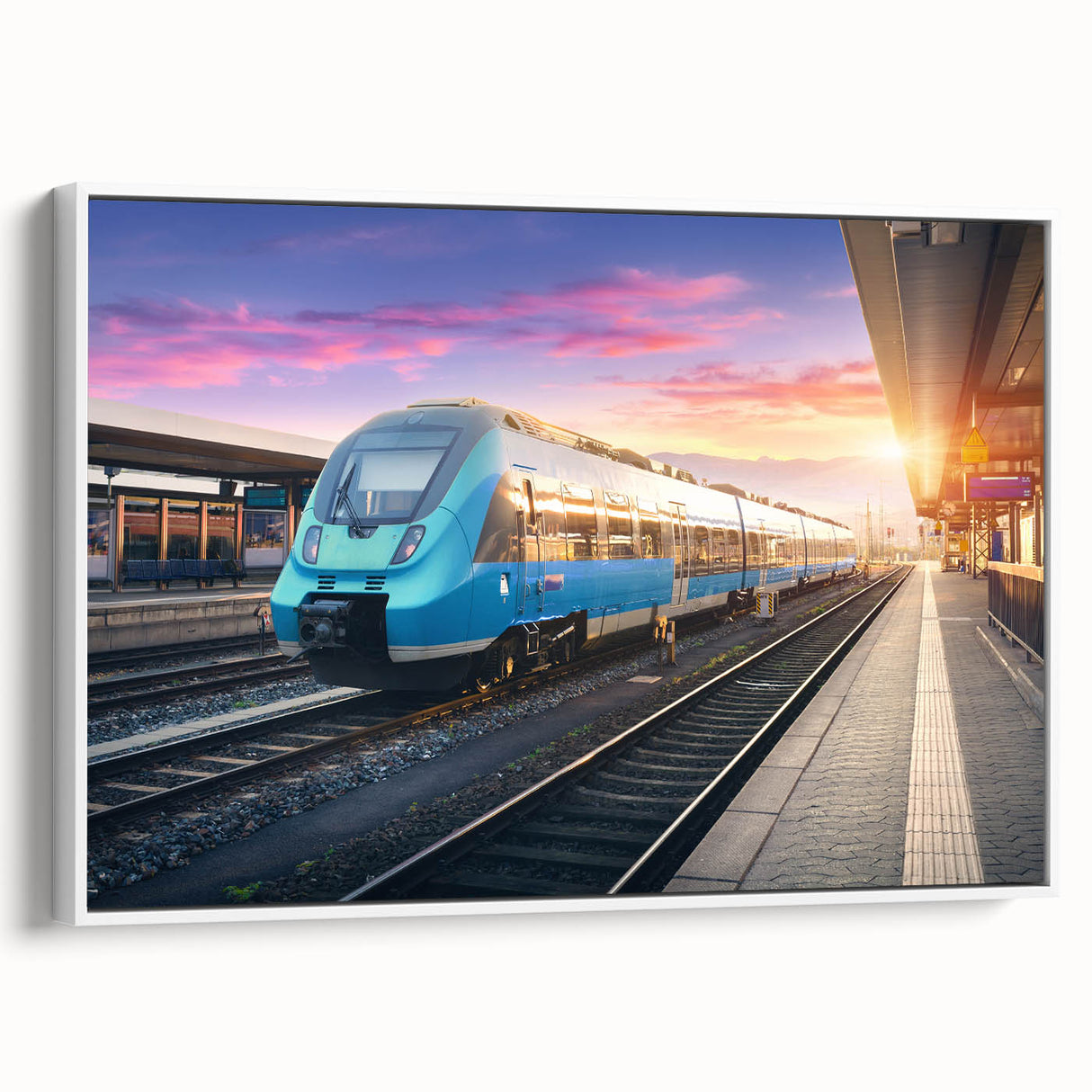 Framed vintage poster art of a colorful train on a black background, ideal for extra large wall art in a living room.