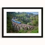 Extra large abstract art print of a colorful, textured train, in a black frame with mat, ideal for living room decor.