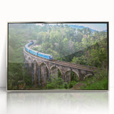 Mid-century modernist train art in acrylic, with silver frame, featuring muted earth tones, ideal for nursery wall decor.