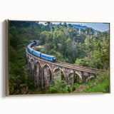 Framed canvas wall art featuring a vintage train in a landscape, rendered in black and gold tones, ideal for bedroom decor.