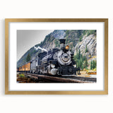 Extra large abstract art print of a train, featuring textured gold and black tones on a framed canvas.