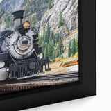 Extra large framed canvas featuring a black locomotive with colorful, textured details, ideal for living room decor.