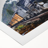 Art deco poster depicting a vintage train in muted gray and blue tones on rolled canvas, suitable for dining room wall art.