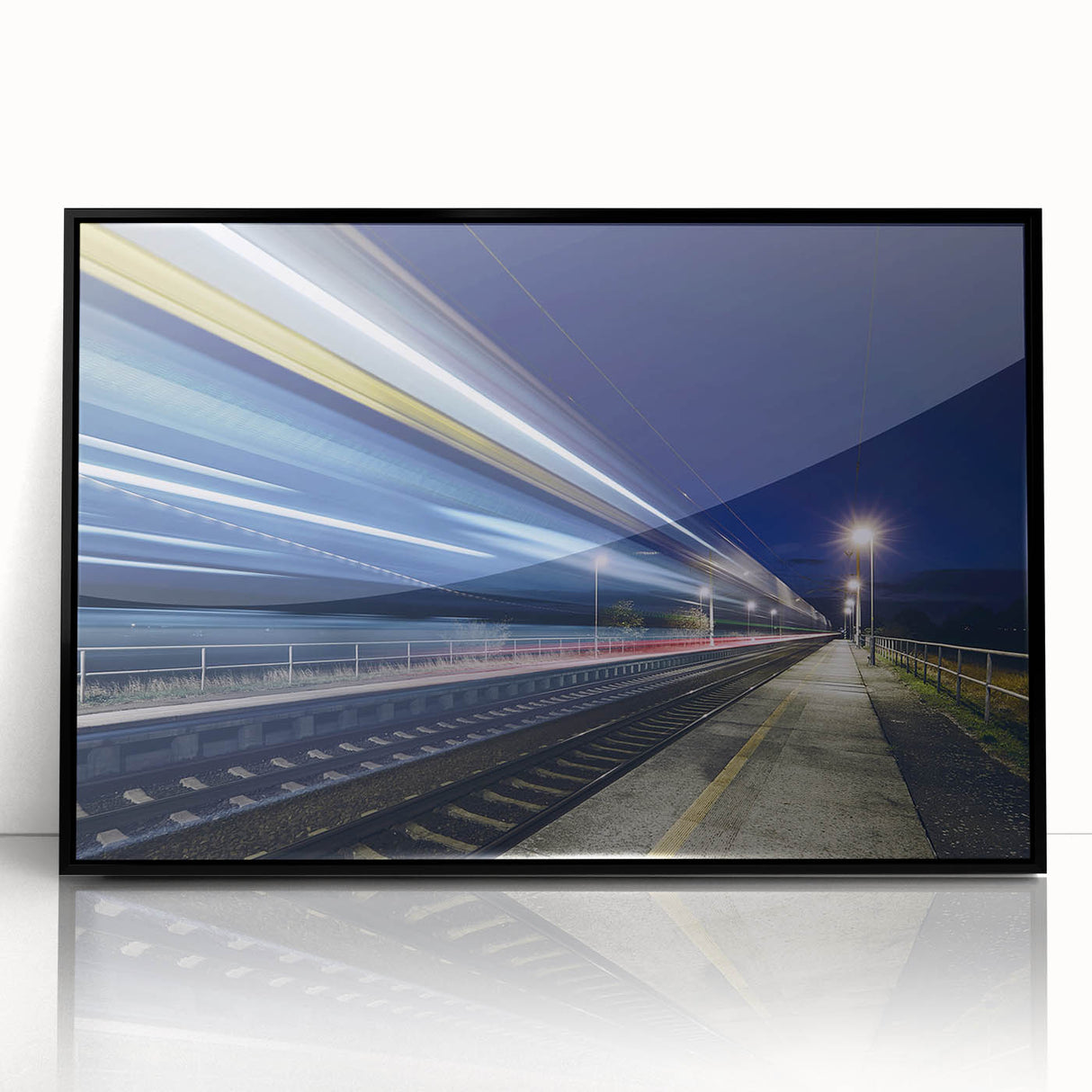 Large abstract wall art of a train in black and gray tones on framed acrylic, suitable for modern decor.