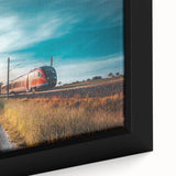 Extra large framed canvas featuring a black locomotive with colorful, textured details, ideal for living room decor.