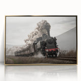 Framed acrylic print of a mid-century modernist train in gold and black tones, ideal for nursery wall art.