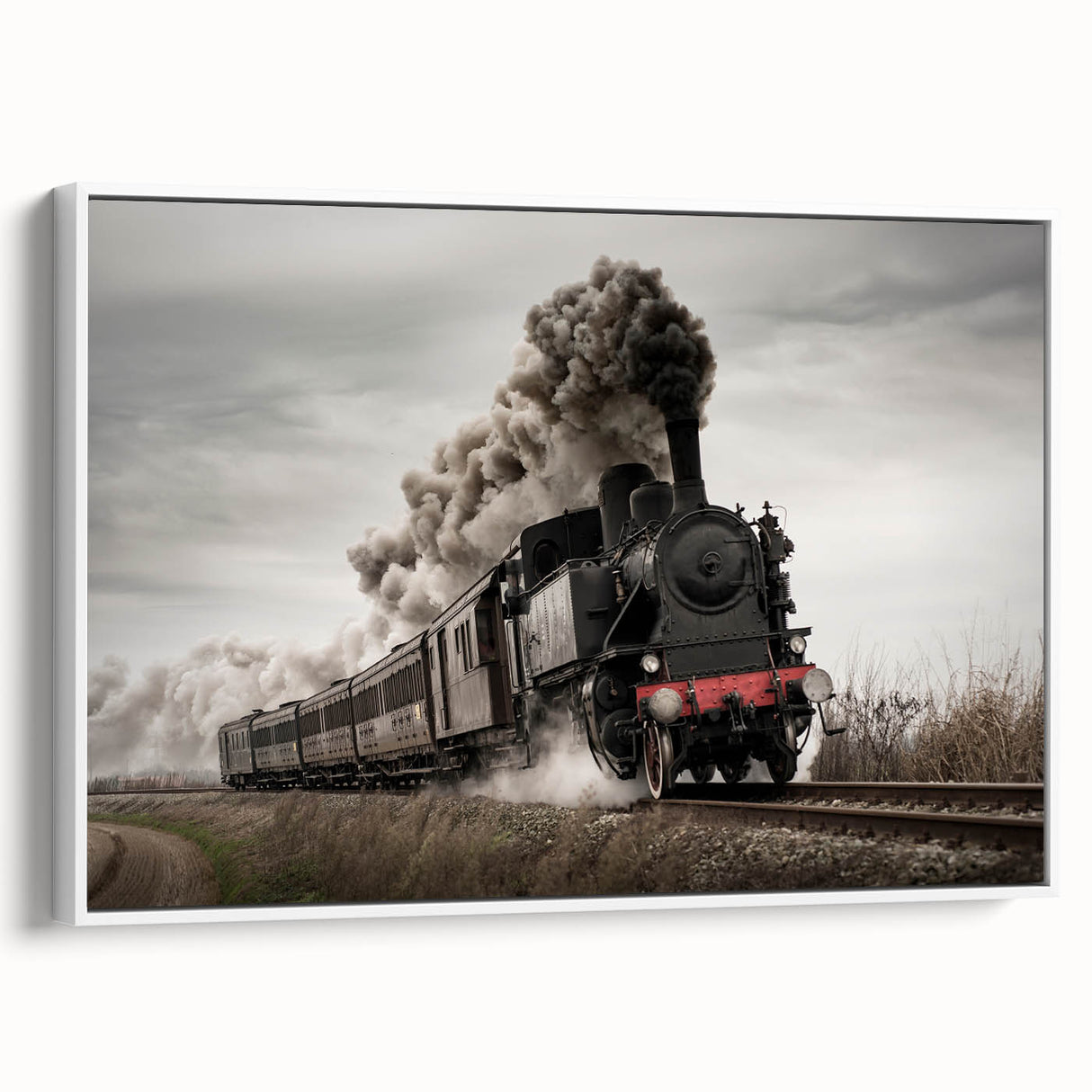 Framed canvas featuring a vintage poster art of a train, using a black and colorful palette.
