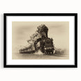 Abstract art print of a colorful, textured train, in a large black frame, suitable for living room decor.