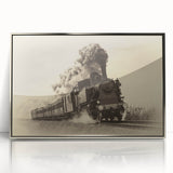 Mid-century modernist train illustration in muted gray and blue, acrylic print framed in silver.
