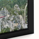 Extra large framed canvas featuring a black textured train design with vibrant colorful art accents.