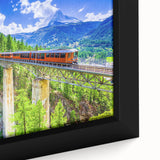 Extra large framed canvas featuring a black steam train with vibrant, colorful details, ideal for living room decor.