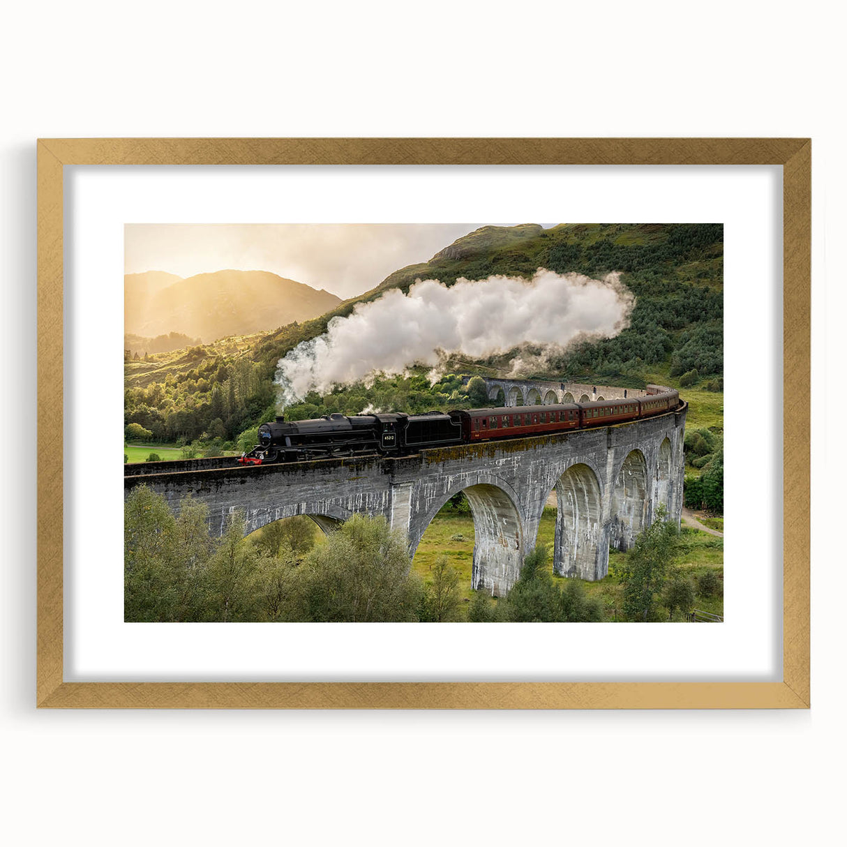 Extra large abstract art print of a train, in textured gold and black tones on a framed canvas, ideal for living room decor.