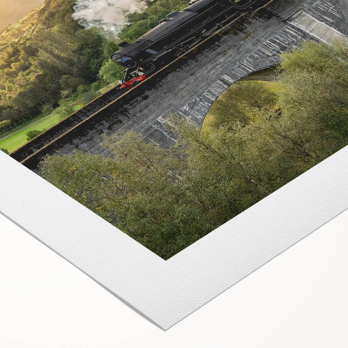 Art deco poster of a streamlined train in silver and blue tones on rolled canvas, suitable for dining room wall art.