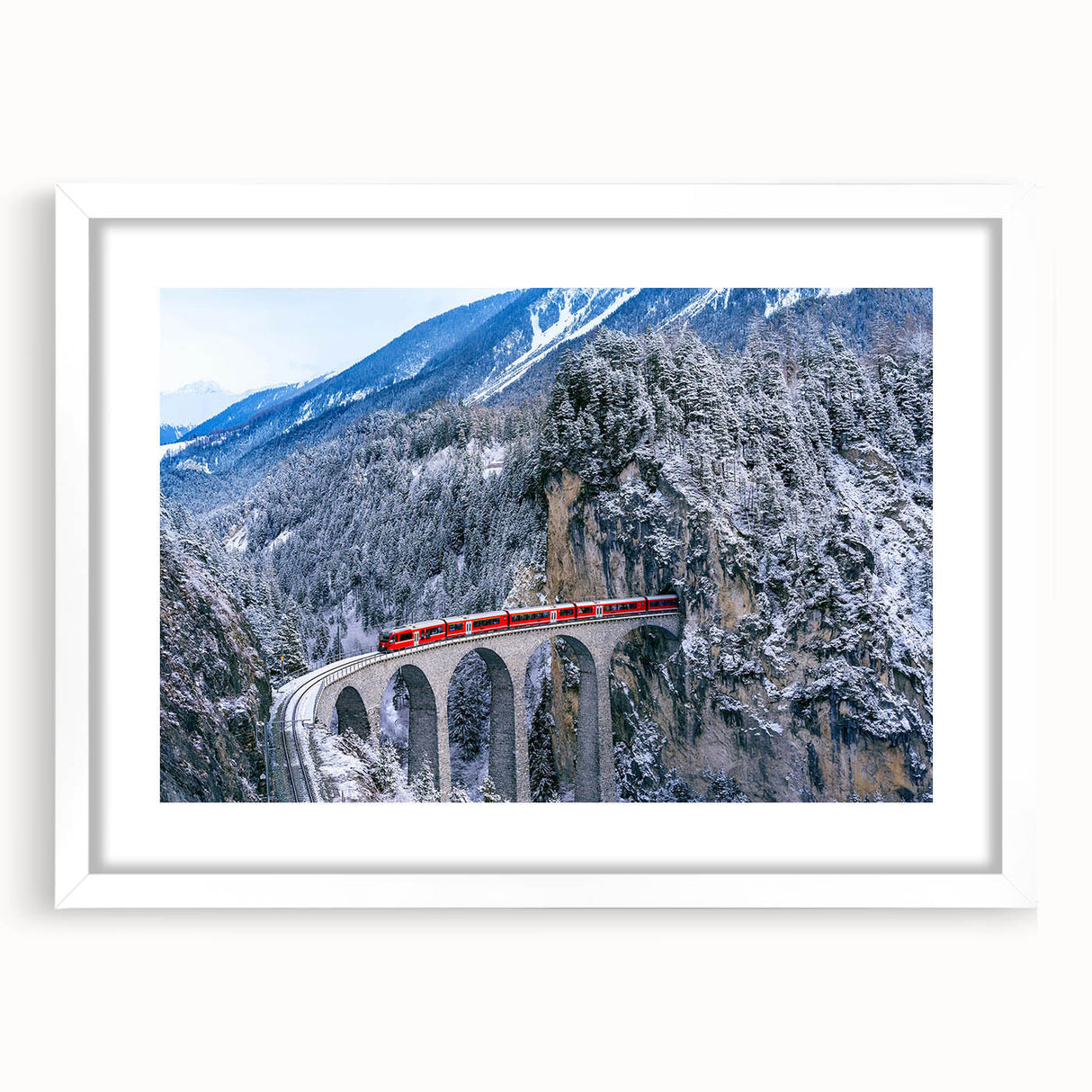 Abstract art print of a train in muted gray and blue tones on a white framed canvas, ideal for dining room decor.