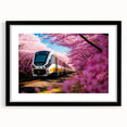 Abstract art print featuring a colorful, textured depiction of a train on a large black-framed canvas.