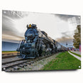 Side view of a train in motion on acrylic glass, featuring gray and blue tones, suitable for modern dining room decor.